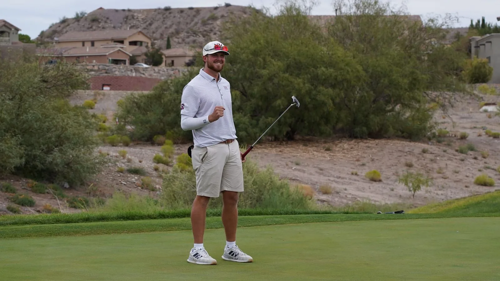 Jackson Funkhouser pumps his fist on the 18th green after winning the 2026 New Mexico Open at Turtleback Mountain Golf & Resort.