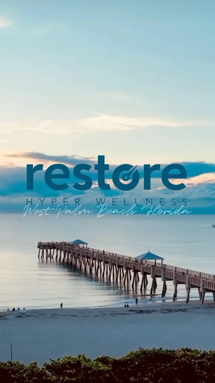 The Restore logo over the West Palm Beach coastline.